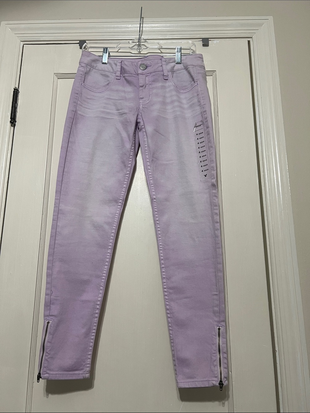 American Eagle Outfitters Lilac Faded Skinny Jeans with zip ankles
